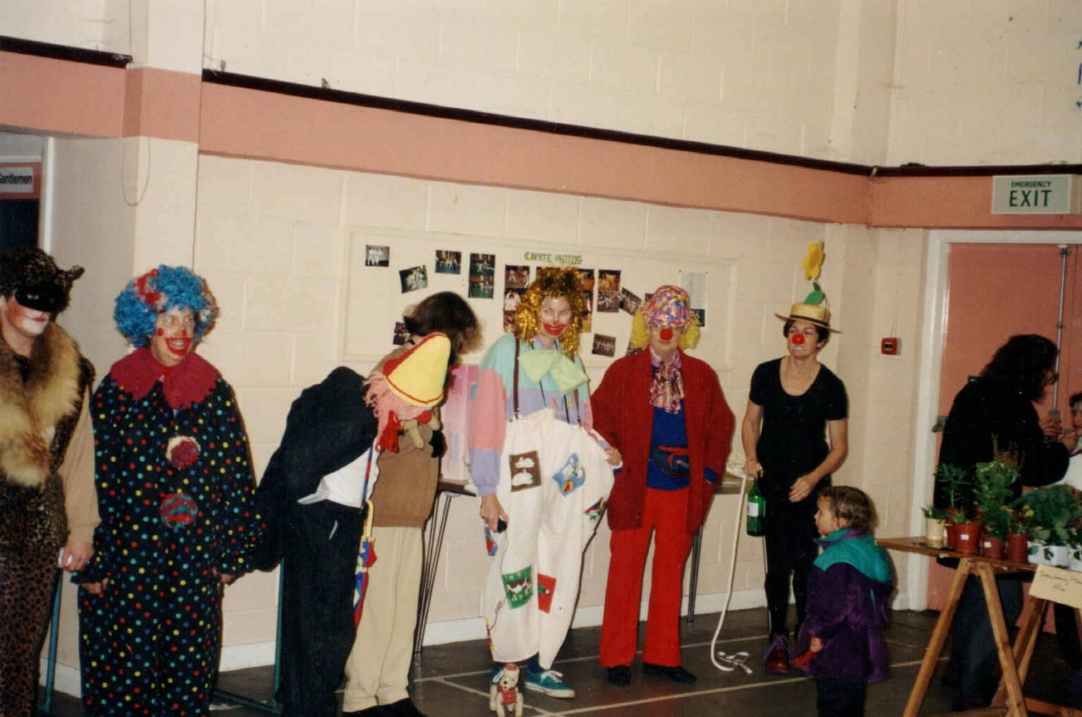 colour photo of a group of people dressed as clowns