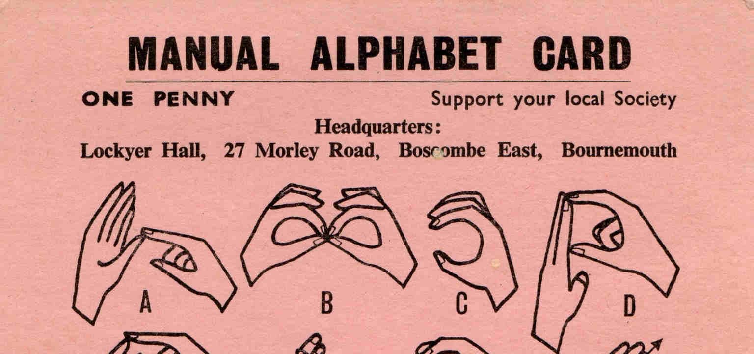Top line of a Manual Alphabet Card showing hand movements for sign language letters A, B, C and D. Other text reads: One Penny. Support your local Society. Headquarters: Lockyer Hall, 27 Morley Road, Boscombe East, Bournemouth
