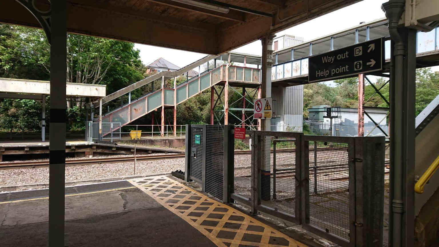 colour photo of modern day steps up from Pokesdown Station platform to the footbridge